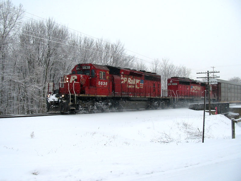 CP 5368
CP #5368 on CP X747 kicking up the snow while heading west by Baldwin St in Jenison. 01/23/04 @ 10:38am 
