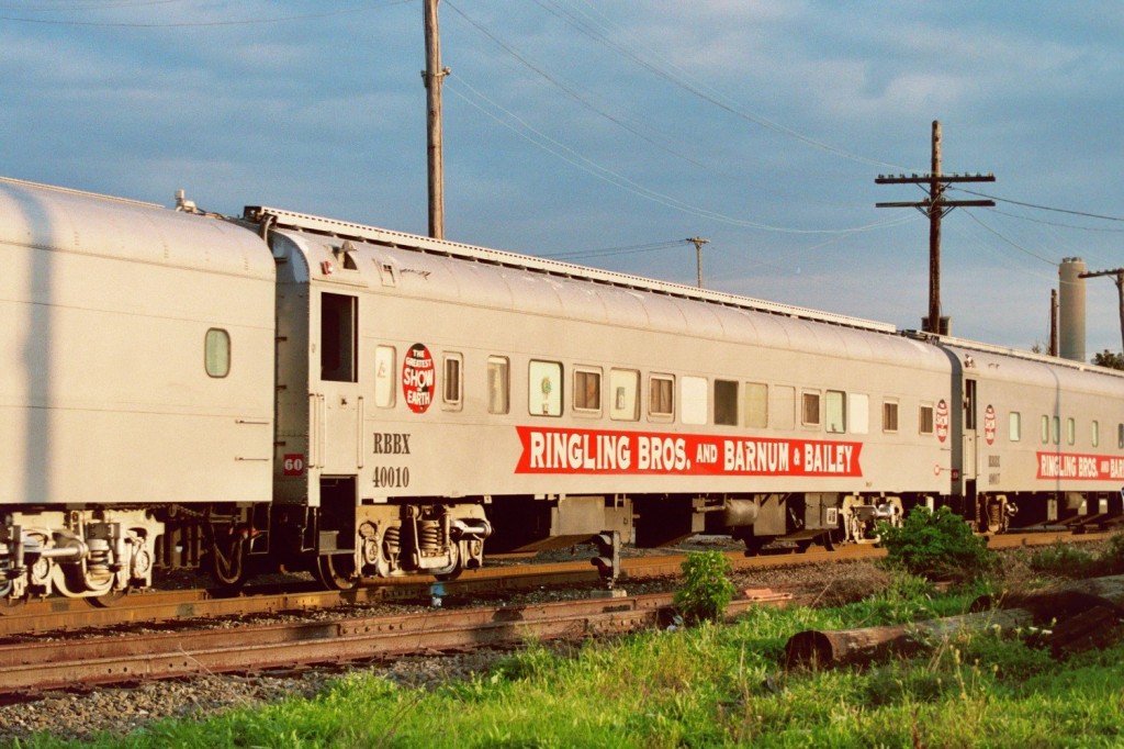 RBBX 40010 Coach
9/25/06 Ringling Bros. and Barnum and Bailey Circus Train Red Unit. One of nearly 30 passenger cars of the 56 total. Built in 1954 by American Car and Foundry as Union Pacific #4583. Northbound through Kalamazoo for Grand Rapids. The dwarf signal in the foreground is the southbound home signal for the diamonds at BO interlocking. 
Keywords: RBBX Circus Red Unit Barnum Bailey Ringling Union Pacific ACF dwarf signal 40010 coach UP Kalamazoo