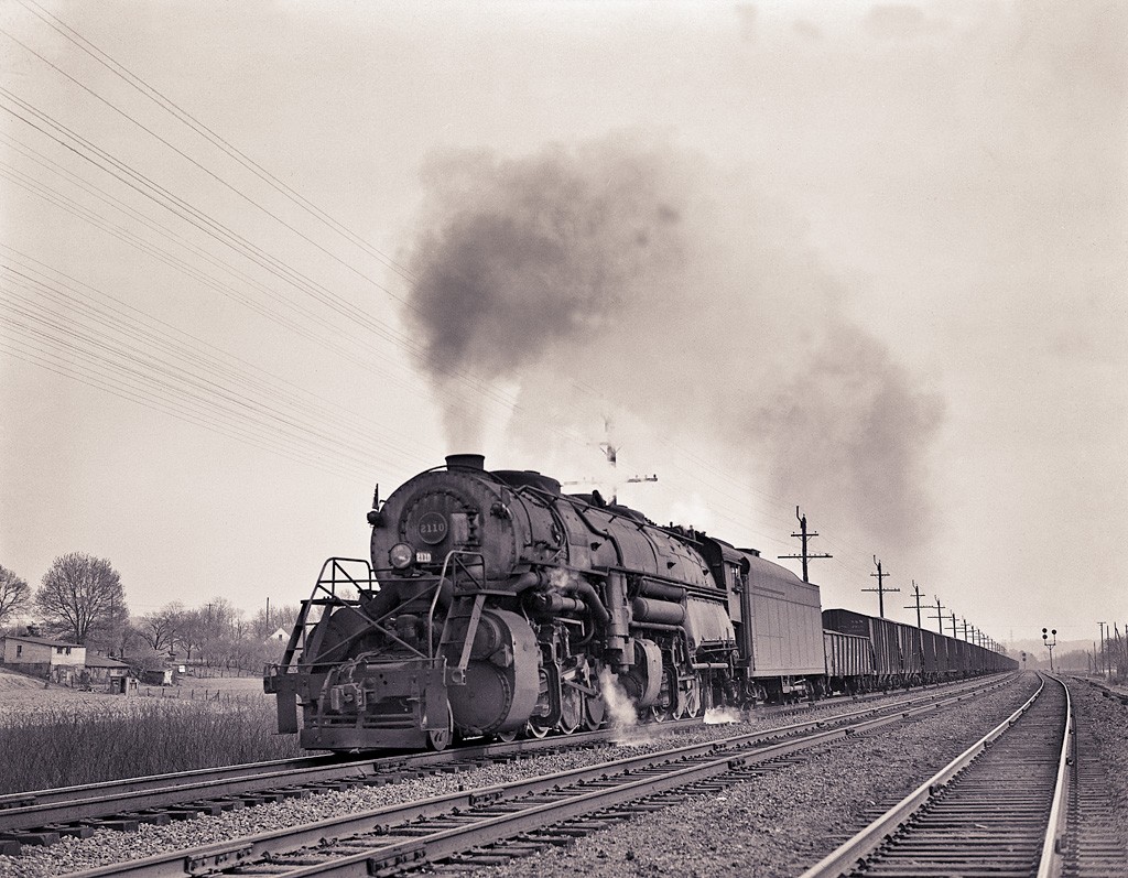 Ohio River Rush
N&W Y6b 2110 moves hoppers at Ironton, Ohio.
Photo by Walter Wilk from a private collection.

Date, Unknown

