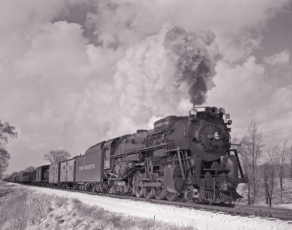 Meanwhile in 1948
February 14, 1948, Plymouth MI is the note on the edge of the 4x5 neg.
The photographers name is Walter Wilk.  From 
a friends collection I'm helping him scan and catalog.
Keywords: PM Pere Marquette 1232 Steam 1948