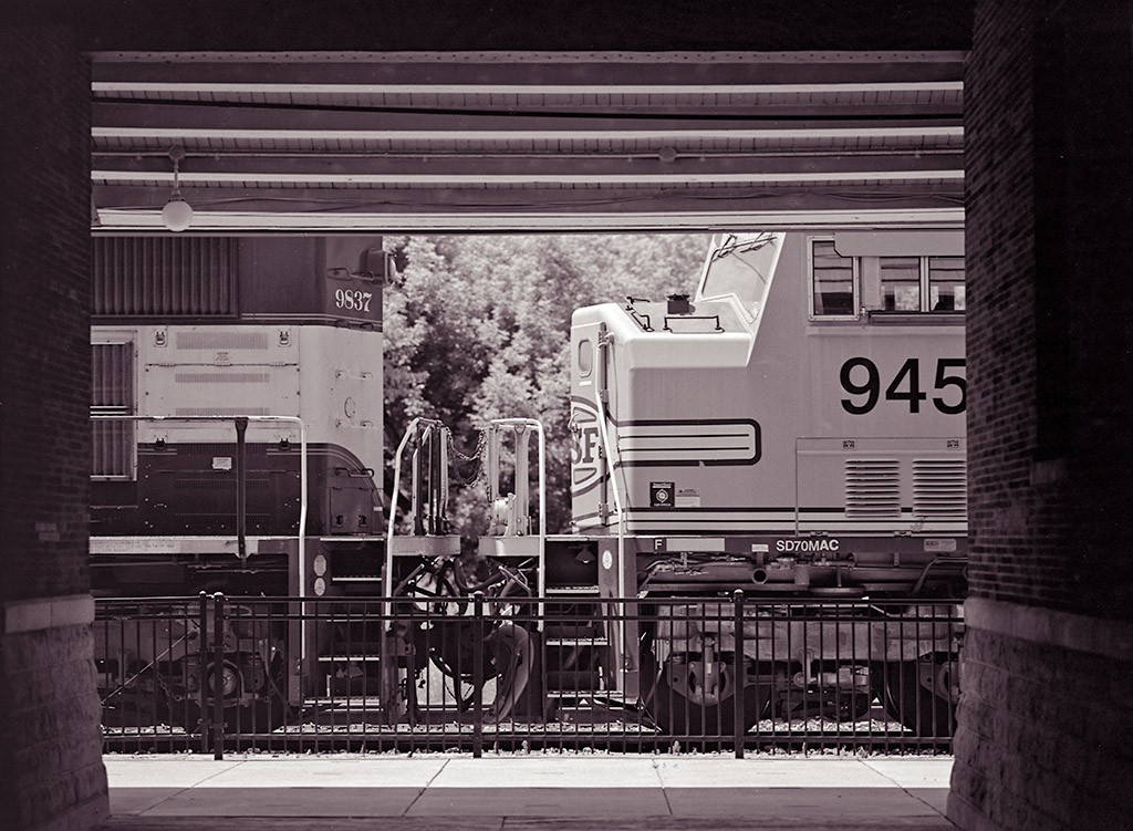 Over on the West Side of the Station
BNSF units back a coal train into the yard at Durand.

July 6, 2010
