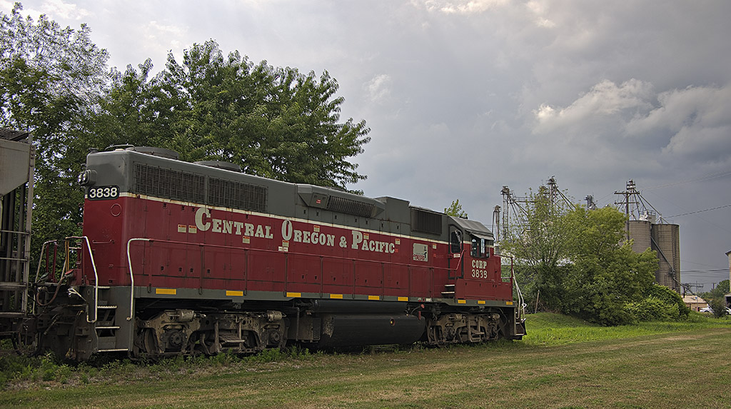 Stormy Layover
CORP 3838 is put away for the day with 4 covered hoppers
behind it and dark clouds ahead at Marlette, Michigan.

July 20, 2009
