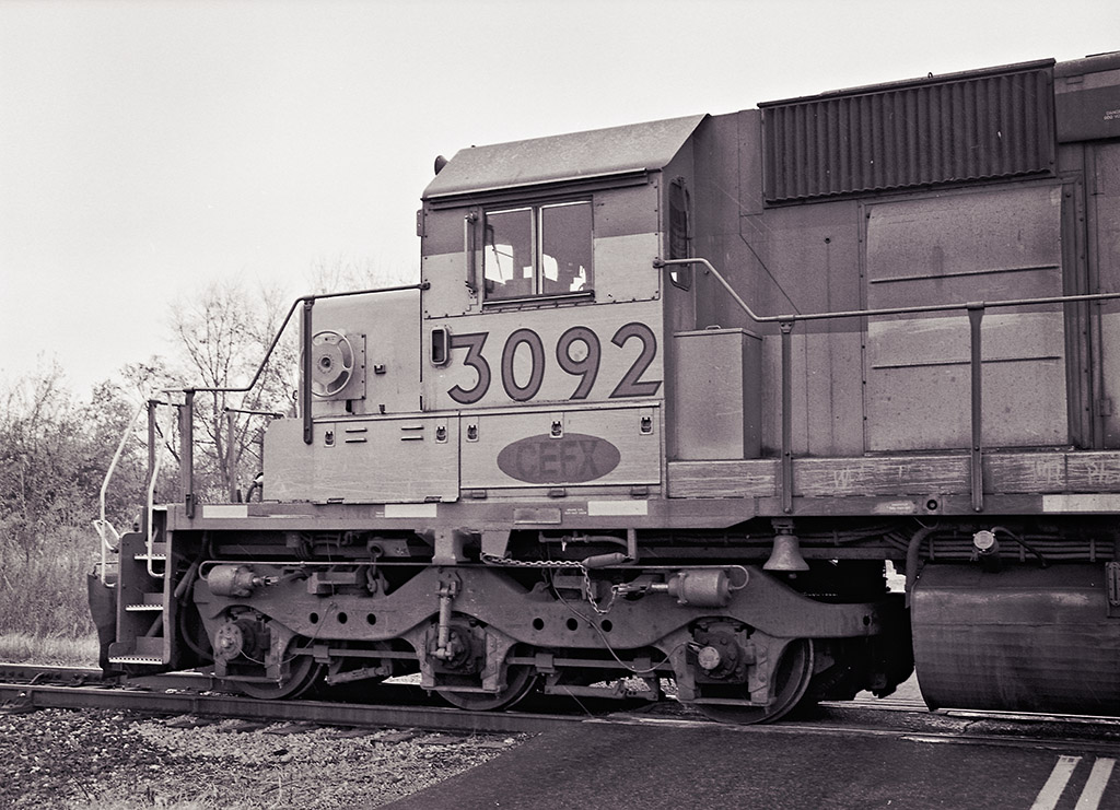 Workhorse
On the Indiana & Ohio at Urbana, Ohio CEFX lessor 3092 pulls out of
a runaround track after letting its' train roll down the connector past
it to get on the other end.

November 9, 2008
