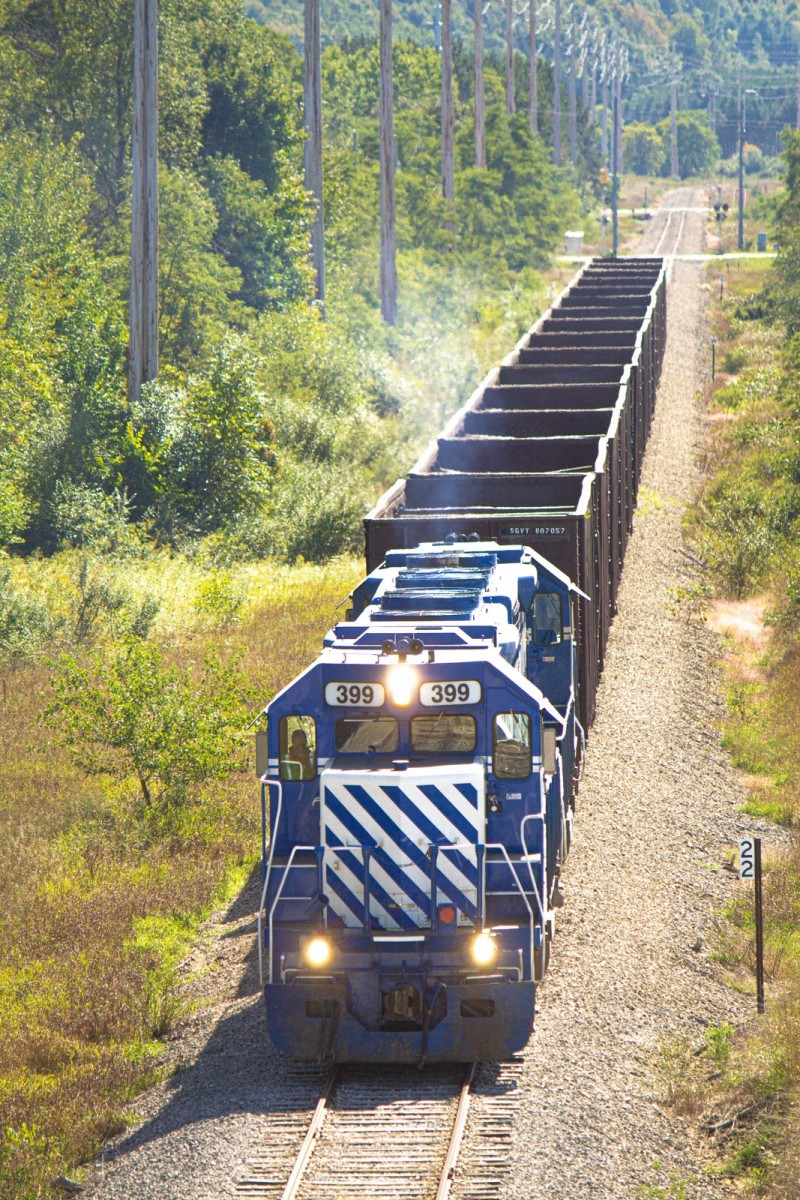 Ballast Train 24 Sept 2019
After spreading the 15 cars, 399/396 run to Traverse City, with orders to pick up two empty lumber cars dropped off at Bates yesterday.
Seen here along Keystone Rd heading into Traverse City.
