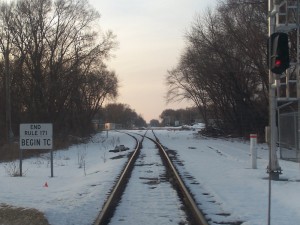 Looking northwest from the signal at the end of CFER. The tracks run right up to the Porter Branch where the diamond is missing.