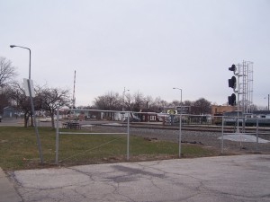 The fence at the east end of the parking lot.