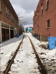 Back in Old Town under the sun, before last week it's been well over a decade since the last revenue car moved on this line. Looking north from Grand River.