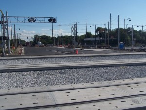 South of the track with asphalt laid (space between tracks waiting).